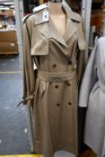 An as new A Line Belted Tencel-Blend trench coat (Tag XXS/XS but fits like a M+ €615).