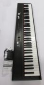 A pre-owned Fazley FSP-200 keyboard piano with pedal.