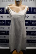 An as new Amie Ellis Alina Cotton Doll dress with ribbon shoulder tie in white (S - RRP £150).