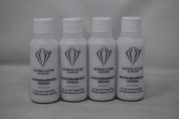 A box of as new Crystal Clear Skincare microdermabrasion crystals (52 bottles per box, 85g