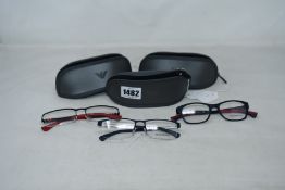 Three pairs of as new Emporio Armani glasses frames.