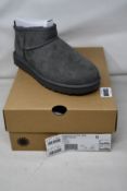 A pair of as new Ugg Classic Ultra Mini (UK 6).