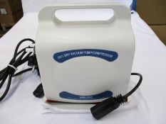 A boxed as new Welch 2511C-02 Dry Vacuum Pump/Compressor.