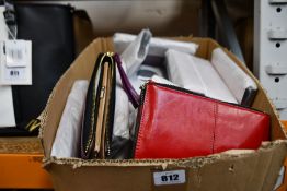 Twenty one assorted purses (Various colours).