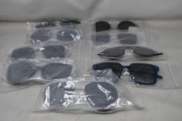 Nine pairs of assorted as new Booth & Bruce sunglasses.