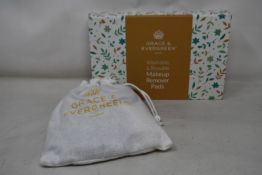 Forty boxed Grace and Evergreen washable and reusable makeup remover pads.