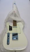 A boxed as new Fender Player Telecaster Left Handed Polar White with Pau Ferro Fingerboard (