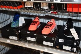 Two pairs of children's Adidas Nemeziz 19.4 FxG football boots (UK 4), a pair of men's Nemeziz .4FxG