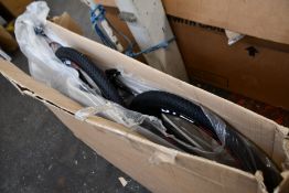 A boxed as new Phoenix push bike (Some damage to bottom of forks).