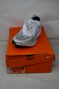 A pair of as new Nike ZoomX Vaporfly Next% 2 (UK 7).