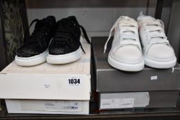 Two pairs of pre-owned Alexander McQueen sneakers (EU 38 Good condition, EU 39 requires attention).
