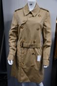 A pre-owned Burberry trench coat (Size 50 - excellent condition).