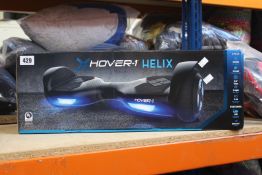 A boxed as new Xhover 1 Helix balance board.