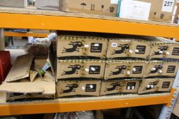 Ten boxes of Earth Rated dog poop bag dispensers with a roll of 15 bags (48 dispensers per box).