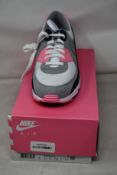 A pair of as new Nike Air Max 90 with authentication tag (UK 10).