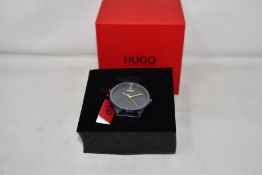 A gents as new Hugo Boss Smash wrist watch.