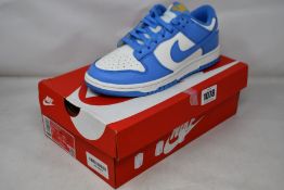 A pair of women's as new Nike Dunk Low (UK 4).