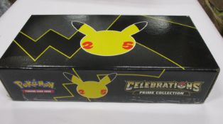 Two as new Pokemon 25th Anniversary Prime Collection boxes.