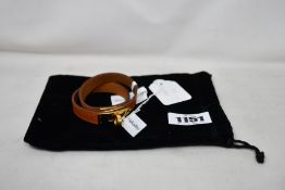 A pre-owned Hermes Kelly Double Tour bracelet.