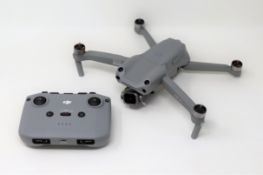 A pre-owned DJI Mavic Air 2 S Drone with battery and controller (Untested, sold as seen).
