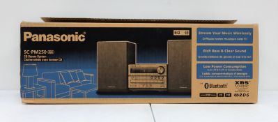 A boxed as new Panasonic SC-PM250 CD Stereo System in Silver (M/N: SC-PM250EG-S) (Box opened).