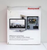 A boxed as new Honeywell MPA2 MPA1002E-MPS Access Control Panel for 2 Doors with 4 Readers, Metal En