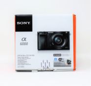 A pre-owned Full Spectrum Converted Sony a6000 E-Mount Camera Body including Battery, Strap and 2-Pi