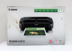 A boxed as new Canon Pixma iX6850 A3 Wireless Photo Printer (Box opened, damage to box).