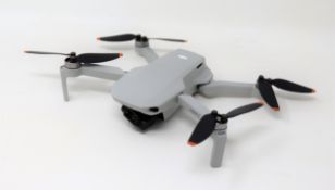 A pre-owned DJI Mavic Mini 2 Drone (Untested, sold as seen).