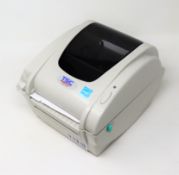 An as new TSC TDP-247 Direct Thermal Desktop Label Printer (PSU included. No Box).