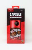 A boxed as new Anker Nebula Capsule Smart Projector in Limited Edition Pringles Design (Box sealed).