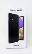 A boxed as new Samsung Galaxy A32 5G 64GB in Awesome Black (Box sealed, some daamge to box).