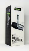 A boxed as new Shure MV7 Podcasting Microphone in Silver (Box sealed).