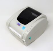 An as new TSC TDP-247 Direct Thermal Desktop Label Printer (PSU included. No Box).