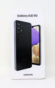 A boxed as new Samsung Galaxy A32 5G 64GB in Awesome Black (Box sealed, some daamge to box).