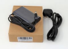 Thirty five boxed as new FXLpower FX00027-UK 19.5V 3.34A 65W Power Supplies for Dell Laptops with UK