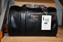 An as new Nova Harley Manhattan blackberry leather changing bag.