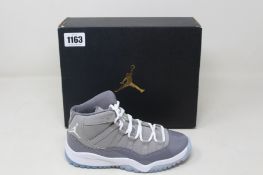 A pair of children's as new Nike Jordan 11 Retro (UK 13K).