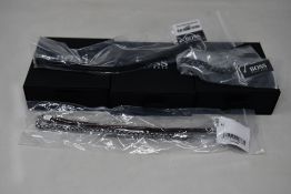 Three men's assorted as new Hugo Boss bracelets; brown leather bracelet 1580149M (RRP £69), chain