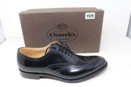 A pair of as new Church's Berlin shoes in black (Size 9).