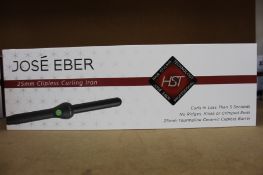 A boxed as new Jose' Eber HST 25mm Clipless Curling Iron (Some minor damage to packaging).