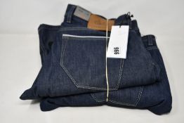 Two pairs of as new Alberto Bike Rain & Windfighter jeans (W34/L32, W36/L32).