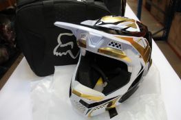 A boxed as new Fox Racing V3 RS Mirer MIPS helmet in White/Black/Gold, ACU gold sticker (Size: XL,