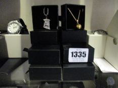 Fifteen assorted Haraves jewellery to include 5x Compass, 5x Globes, 5x Jesus.