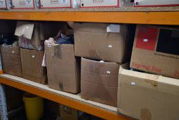 Eight boxes of assorted pre-owned clothing and related items.