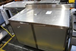 A pre-owned Duke RUF-48m commercial two door refrigerated counter.