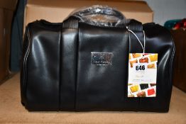 An as new Nova Harley Manhattan blackberry leather changing bag.
