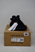 A pair of as new Adidas Yeezy Boost 350 V2 (UK 5).