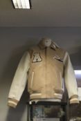 An as new Axel Arigato Mayday Varsity bomber in beige (L).