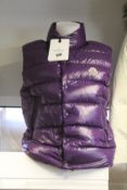 An as new Moncler Tibb gilet in purple (TG 2 - RRP £675).